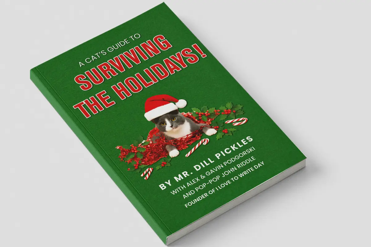 Close-up of the book A Cat’s Guide to Surviving the Holidays by Mr. Dill Pickles on a green cover with festive design.