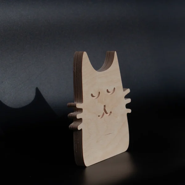 Zen Cat warm grain plywood cat angled view Angled view of handmade plywood cat decor with layered edges