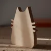 Plywood cat decor side and back detail Side and back view of handmade plywood cat decor showing layered construction