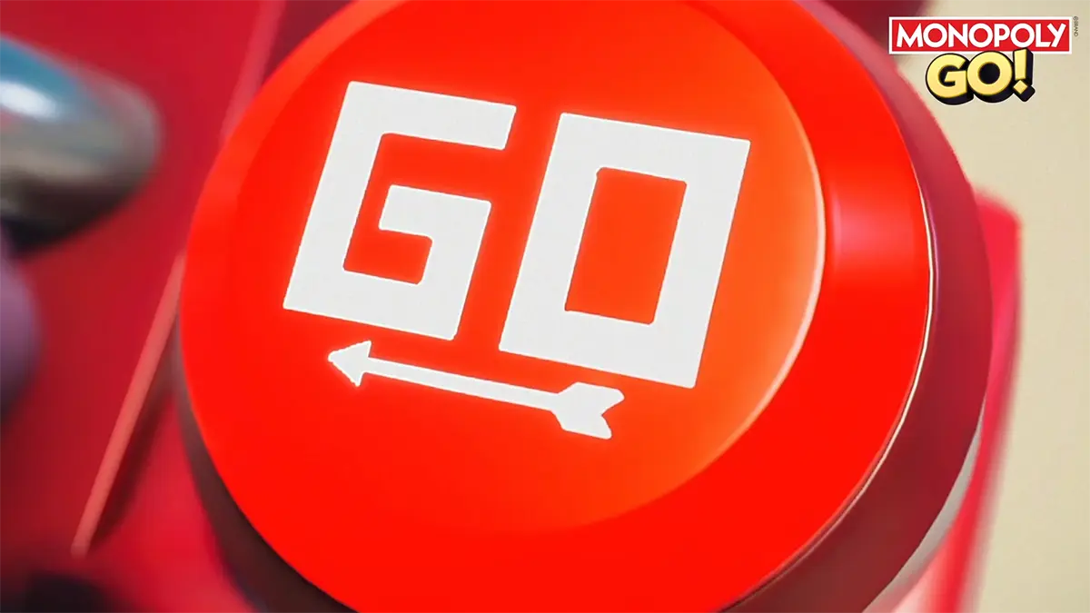 Close-up of the red GO button in the MONOPOLY GO mobile game
