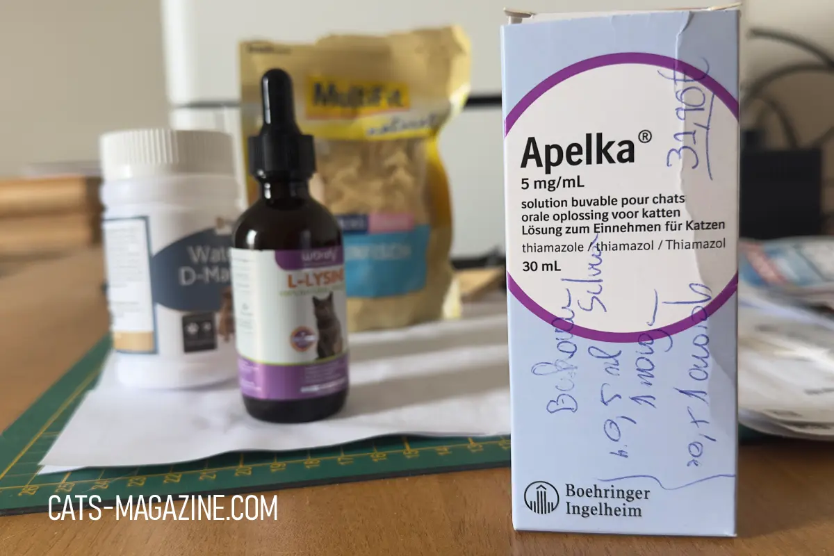 Apelka liquid medication for cat hyperthyroidism with supplements on table
